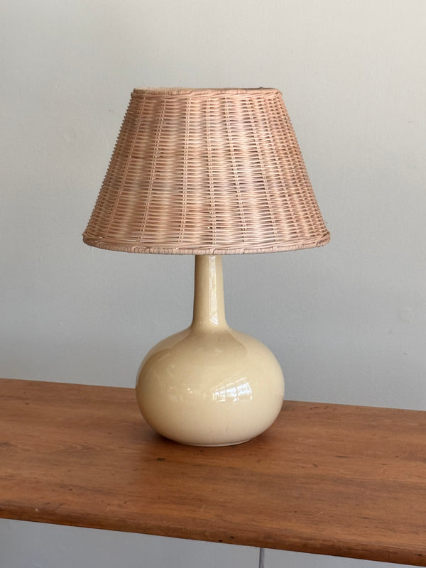 1960S BUTTER YELLOW CERAMIC LAMP WITH NEW WICKER SHADE